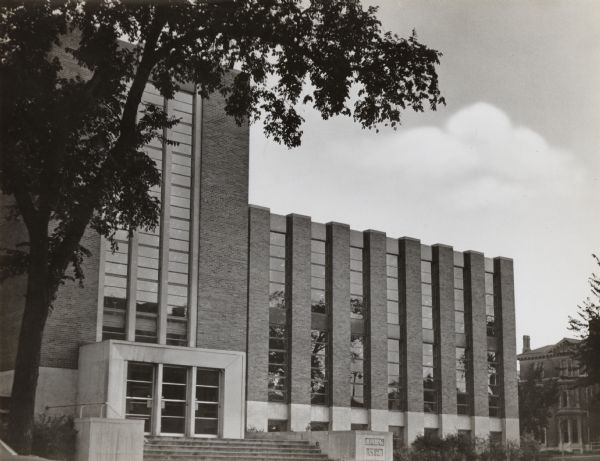 Exterior of library building with entrance to the left of center.