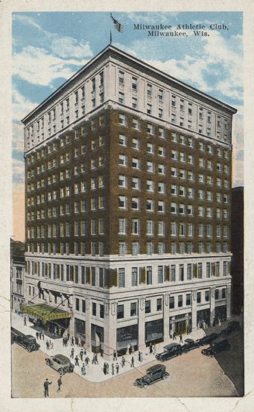 Elevated view of the building on a street corner, with a flag flying from the roof. The street has parked cars and pedestrians are on the sidewalks. Caption reads: "Milwaukee Athletic Club, Milwaukee, Wis."