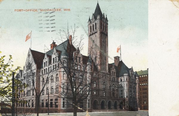 Two flags are on top of the building, and the tower is on the right. Caption reads: "Post-Office, Milwaukee, Wis."