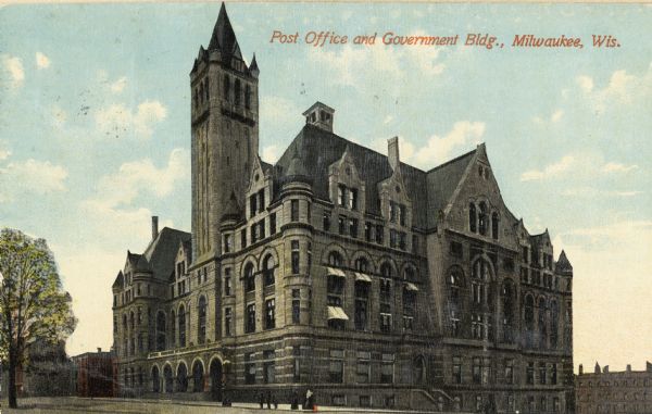 Exterior view of post office, with tower on left side. Pedestrians are on the sidewalk at the corner. Caption reads: "Post Office and Government Bldg., Milwaukee, Wis."