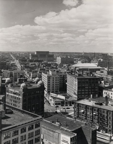 Elevated view from the First Wisconsin National Bank Building, down Wells Street toward the Milwaukee County Court House. Commerce office on lower left.