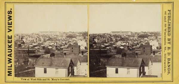 Stereograph.  Elevated view of rooftops on the west side, with St. Mary's Convent in the background.
