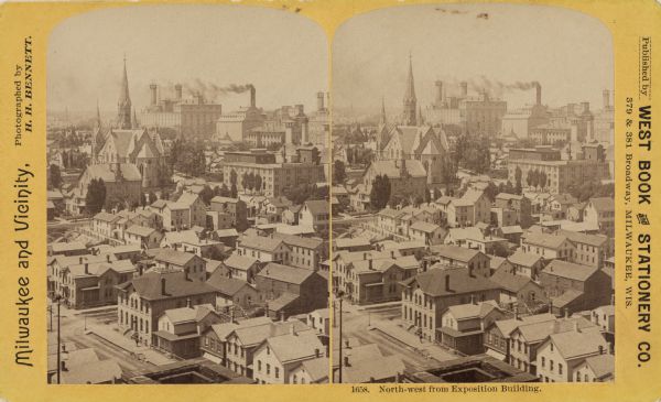 Stereograph of elevated view looking northwest from Exposition Building. There is a church on a street corner on the left, and the Best Brewing Company in the distance.