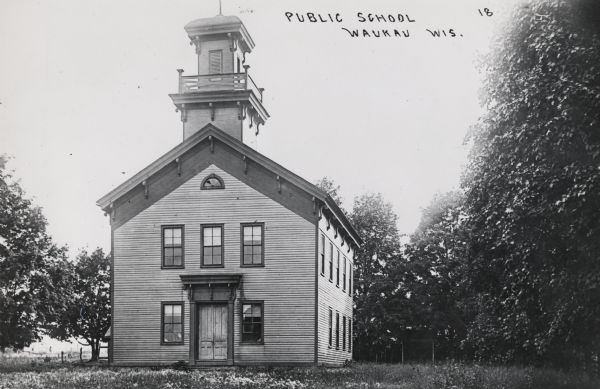 Public school built in 1856 and destroyed by fire on December 15, 1925.  The bell tower has a small balcony.