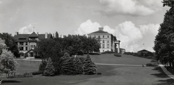 View from lawn of College of Agriculture on a hill on the campus of the University of Wisconsin-Madison. On the left is Hiram Smith Hall.