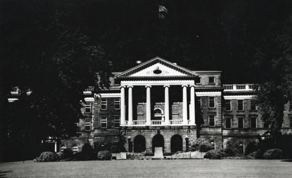 Exterior of front entrance of Bascom Hall (formerly Main Hall) on University of Wisconsin-Madison campus. The Lincoln Statue is visible in front of the building.