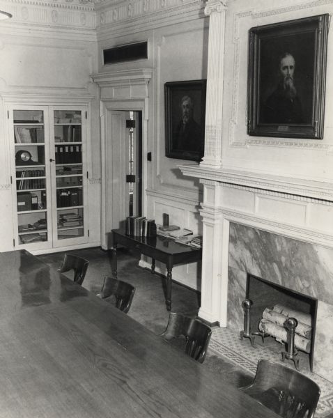 President's office with fireplace and large table in Bascom Hall (formerly Main Hall) on the University of Wisconsin-Madison campus.