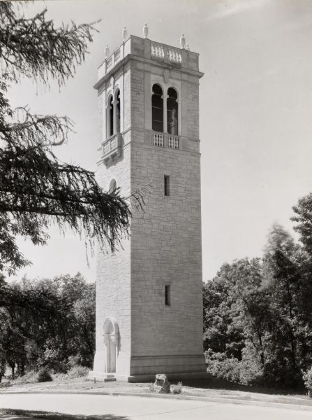 Carillon Tower on the University of Wisconsin-Madison campus.  The entrance is on the left near Observatory Drive. There is a plaque on a rock near the curb.