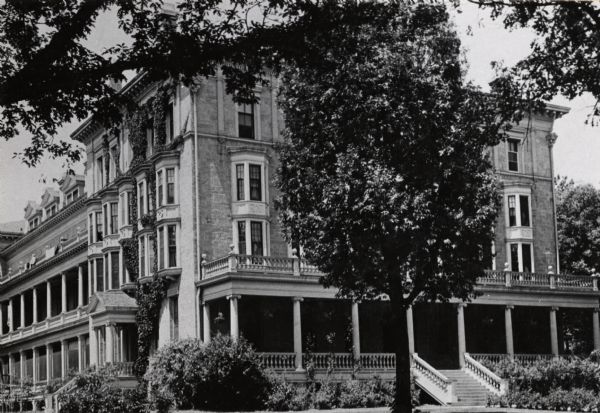 Exterior of Chadbourne Hall, a women's dormitory, on the University of Wisconsin-Madison campus. There are wide steps leading to a porch on the front of the building.