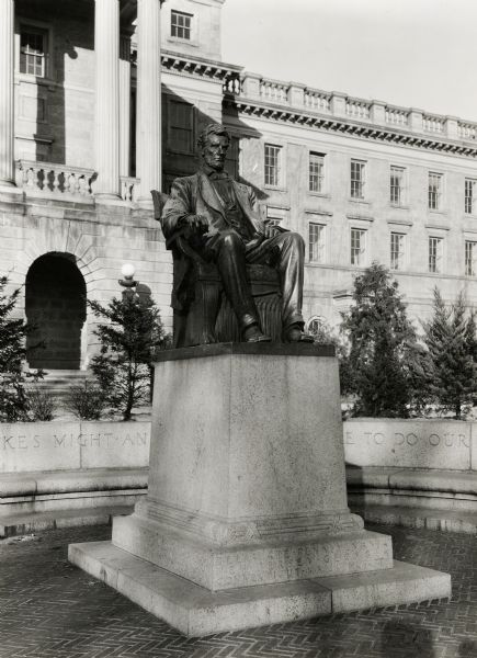 Lincoln Monument in front of Bascom Hall on the University of Wisconsin-Madison campus. The base of the statue has state names carved into it.