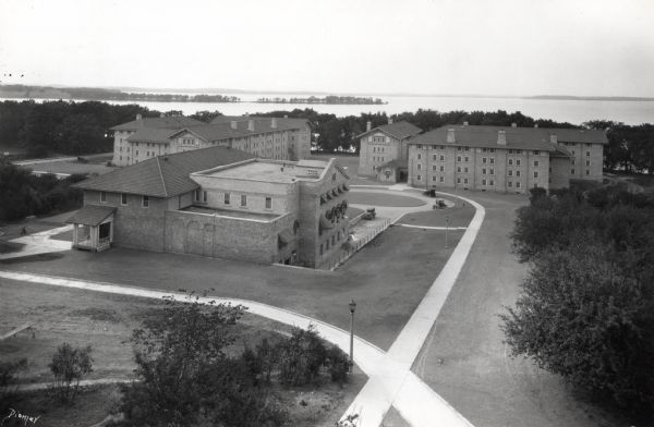 Elevated view of dormitories on the University of Wisconsin-Madison campus. Adams, Van Hise and Tripp Halls with Lake Mendota in the background. Picnic Point can be seen in the distance.