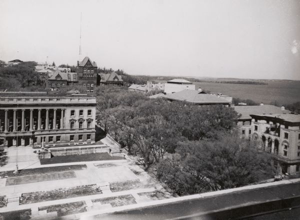 View from roof top of lower campus at the University of Wisconsin-Madison. Wisconsin Historical Society is in left foreground and Science Hall is visible behind it. Memorial Union is on the right along Langdon Street, with Lake Mendota and Picnic Point in the background.