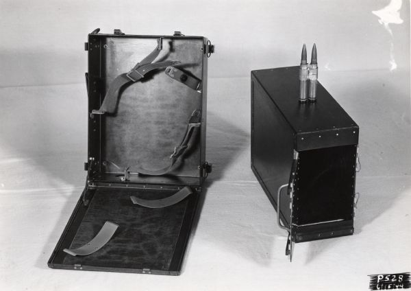 Glavin box and an ammunition box, two plastic laminate products manufactured for the war effort by the Plastics Division of the Consolidated Paper Company of Wisconsin Rapids.
