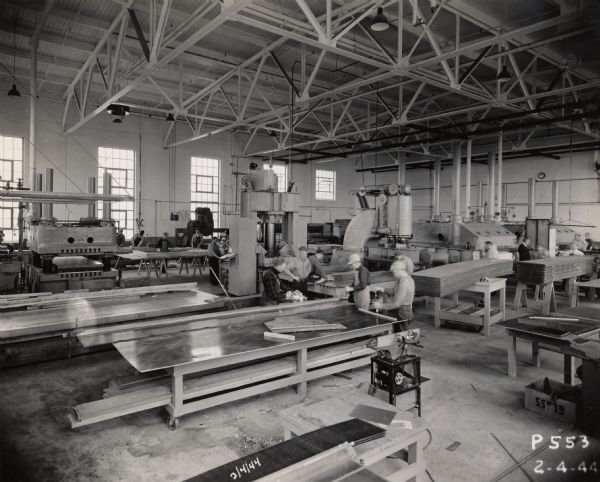 Interior view of the factory of the Plastics Division of the Consolidated Paper Company during World War II.