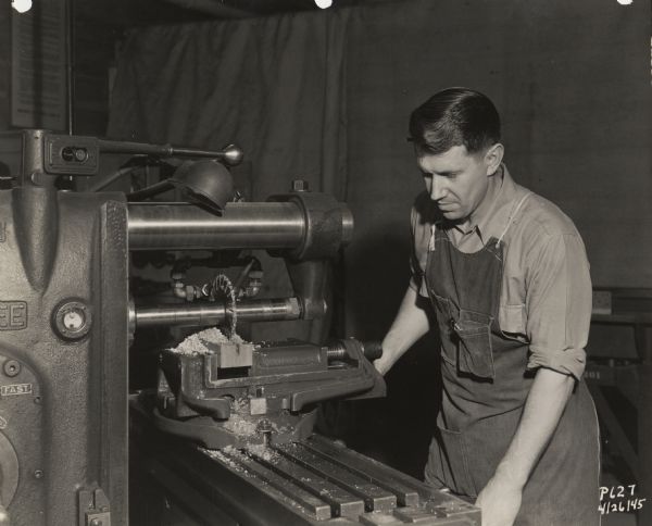 An unidentified employee of the Plastics Division of Consolidated Paper Company during World War II.