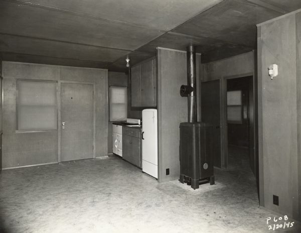 Interior of a modular home developed by the Plastics Division of the Consolidated Paper Company. The project was developed in anticipation of the need for inexpensive housing after the end of the war.