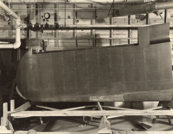 A photograph of what is thought to be a prototype glider part developed by the Plastics Division of the Consolidated Papers Company during World War II.