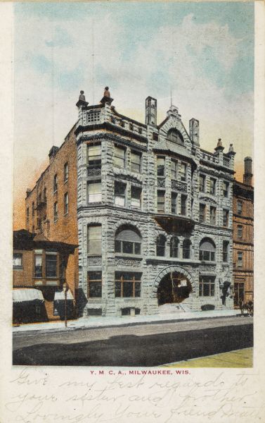 View across street toward the Young Men's Christian Association building (YMCA). Caption reads: "Y. M. C. A., Milwaukee, Wis."