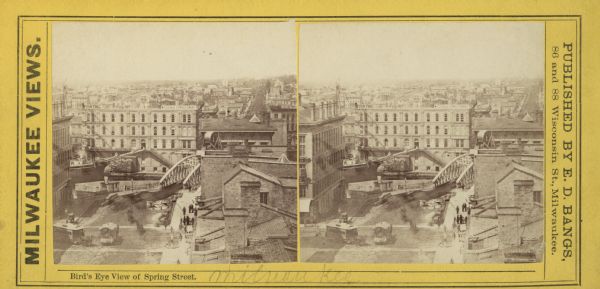 Stereograph of Wisconsin Street looking east from Spring Street.