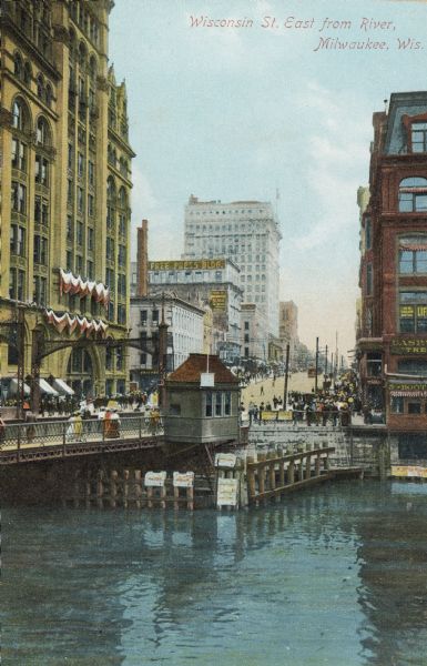 Wisconsin Street looking east from the River Bridge. Caption reads: "Wisconsin St. East from River, Milwaukee, Wis."