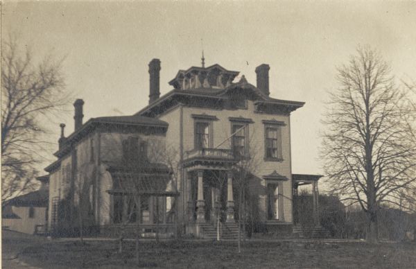 The Daniel Wells, Jr. home, later belonging to Chas. W. Norris, on Grand Avenue.