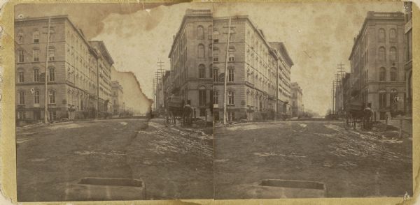 Stereograph of East Water Street and Michigan.