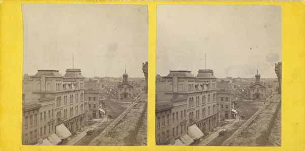 Elevated stereograph of East Water Street showing City Hall.