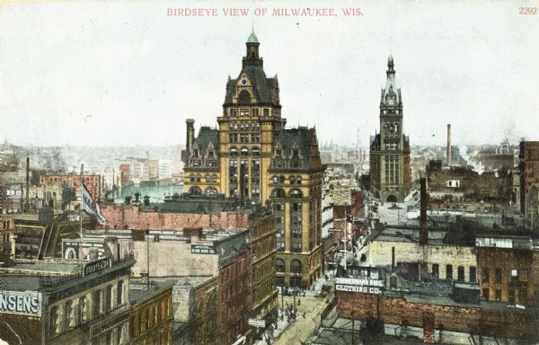 Elevated view, showing City Hall, and Hansen's and Zimmerman's Clothing Co., among other buildings. Caption reads: "Birdseye view of Milwaukee, Wis."