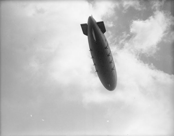 View from below of blimp, USS "Akron" during a test flight that took it over Milwaukee.