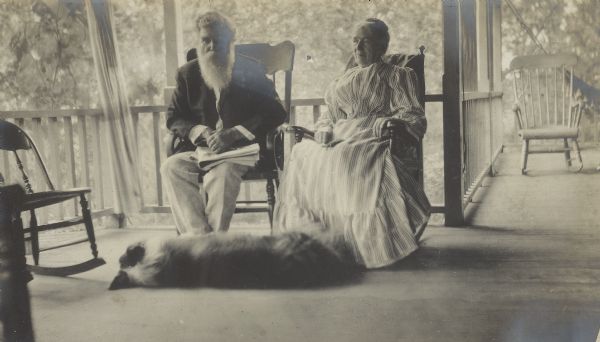 Rev. Jenkin Lloyd Jones and Susan Lloyd Jones and their collie, Roger, probably on the porch of a cottage.  Susan died Oct 26, 1911 and Jenkin died Sept 12, 1918.