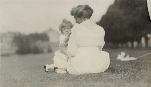 Georgia Lloyd Jones and her daughter Florence (Bis or Bisser) on the campus of the University of Wisconsin-Madison.  Agricultural Hall is in the background.