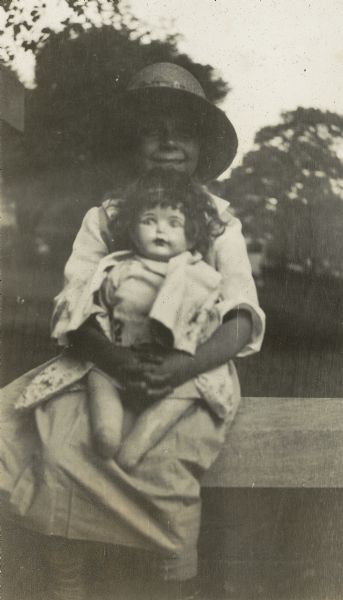 Florence (Bis) Lloyd Jones holding her doll.