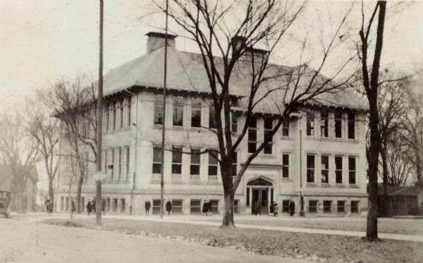 Harvey School (demolished), 1005 Jenifer Street at South Brearly Street, Marquette neighborhood.  Designed by Louis Claude and Edward Starck, built in 1905 and origionally called Washington Irving School through the 1913-14 school year.  The view shows of the rear of the school as seen from across Spaight Street.  School was designed by Louis Claude and Edward Starck.
