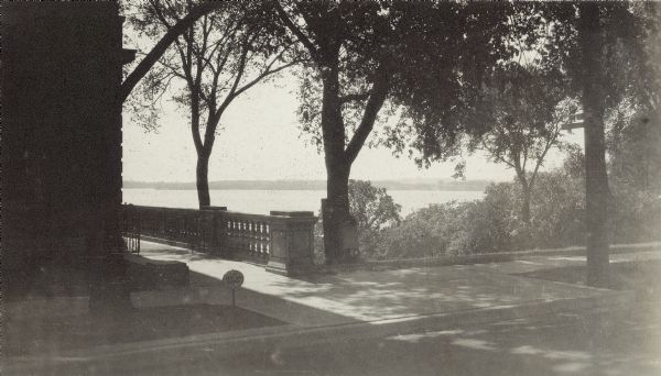 A view of the stone balustrade along the walk to the entrance of the Madison Club, 5 East Wilson Street at the foot of Martin Luther King Jr. Blvd. Lake Monona is in the background.