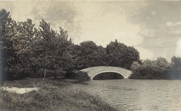 Marston Bridge (across from 418 Marston Avenue) over the lagoon in Tenney Park.