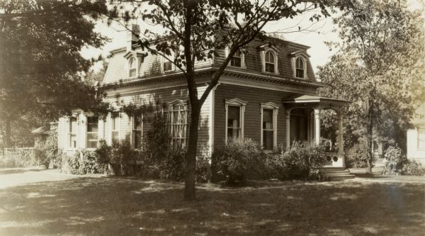 French Second Empire style, C. Loftus Martin House, 327 Milton Ave., built ca. 1868. Richard Lloyd Jones was born in Janesville in 1873 and lived there until Rev. Jones moved the family to Chicago in 1881.  This picture was taken when Richard moved his family from Madison to Tulsa, Oklahoma, in 1919.