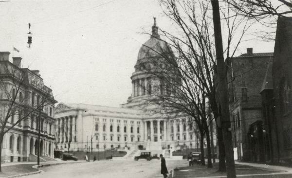 Wisconsin State Capitol from Wisconsin Avenue, with the United States Federal Courthouse and Post Office on the left, and Madison City Hall and Christ Presbyterian Church on the right.