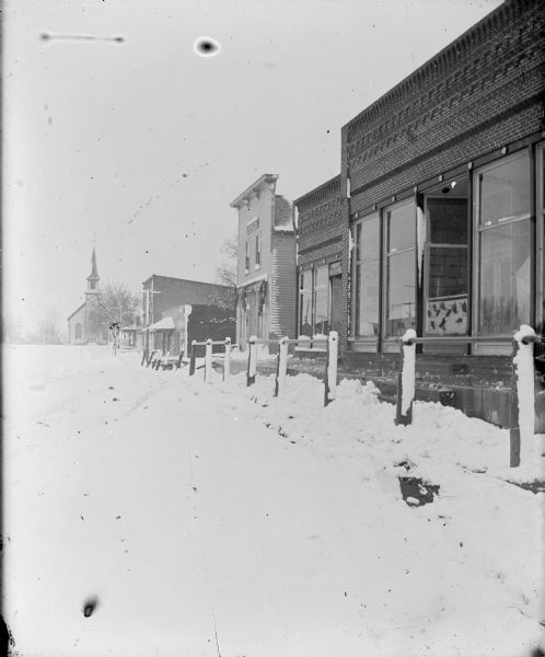 Main Street and church in winter.