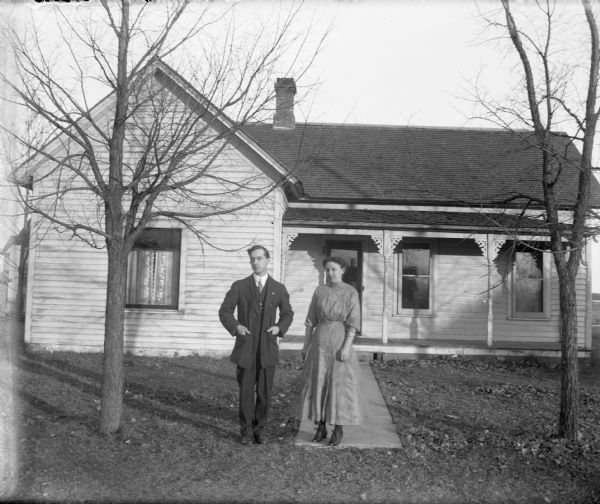 Otto and Grace Lindner in front of their home.