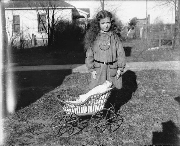 Ruth Lindner and her doll buggy.