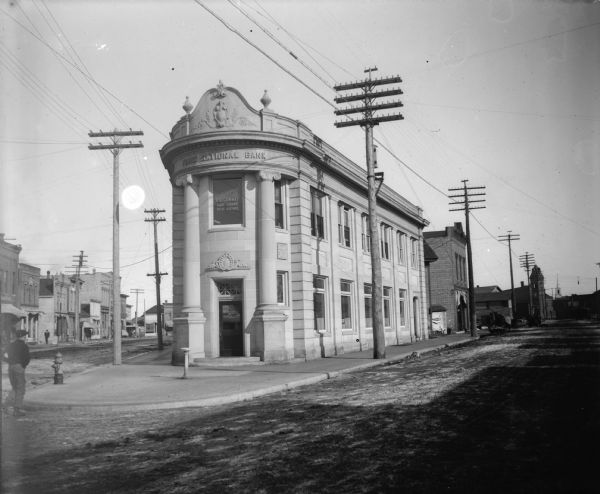 Exterior view of the First National Bank. Front and Center Streets.