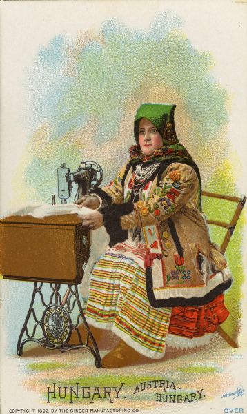 Chromolithograph card of a woman in "native" Hungarian costume, posing with a Singer sewing machine. Part of a "Costumes of All Nations," set created as a souvenir at the 1893 World's Columbian Exposition.