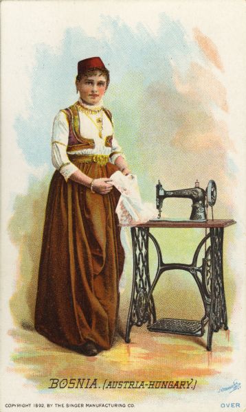 Chromolithograph card of a woman in "native" Bosnian costume, posing next to a Singer sewing machine. Part of a "Costumes of All Nations," set created as a souvenir at the 1893 World's Columbian Exposition.