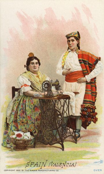 Chromolithograph card of a Spanish couple from Valencia in "national" Valencian costume, posing next to a Singer sewing machine. Part of a "Costumes of All Nations," set created as a souvenir at the 1893 World's Columbian Exposition.