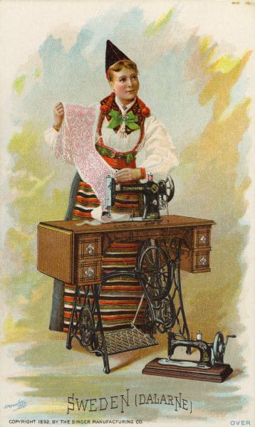 Chromolithograph card of a woman from Sweden (Dalarne) in "native" Swedish costume, posing next to a Singer sewing machine. Part of a "Costumes of All Nations," set created as a souvenir at the 1893 World's Columbian Exposition.