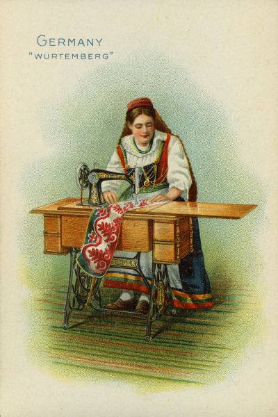 Chromolithograph card of a woman from Wurtemberg, Germany in "native" costume, posing next to a Singer sewing machine.