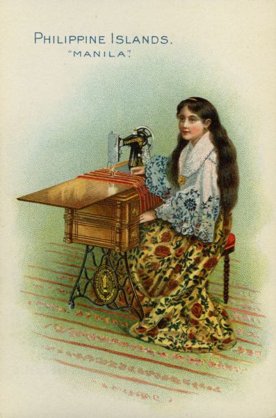 Chromolithograph card of a young woman from Manila in the Philippine Islands in "native" costume, posing near a Singer sewing machine.