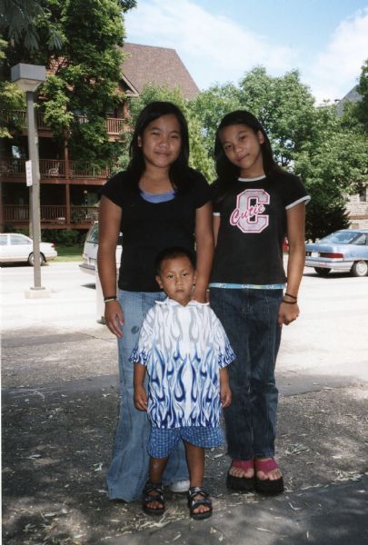 Portrait of three Hmong children.