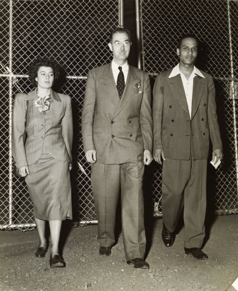 James Dombrowski (center), head of the Southern Conference for Human Welfare (SCHW), leaving the Birmingham jail with Doris Senk and the Rev. C. Herbert Oliver. Dombrowski and Senk were arrested because they and other whites had violated the city's segregation laws by entering the wrong door of Oliver's African American church. Rev. Oliver was arrested for allowing unsegregated seating in the church which he was serving in a pastoral capacity. The following Tuesday, Judge Oliver Hall dismissed the charges saying that his courtroom did not have signs separating the races. 
