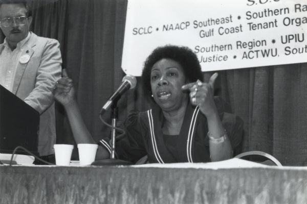 Gwen Patton reporting on the Southern Rainbow Education Project to a conference called by the Southern Organizing Committee (SOC).